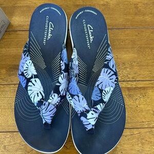 Never worn!  Clarks Cloud-steppers in navy purple floral.   Size 9 wide